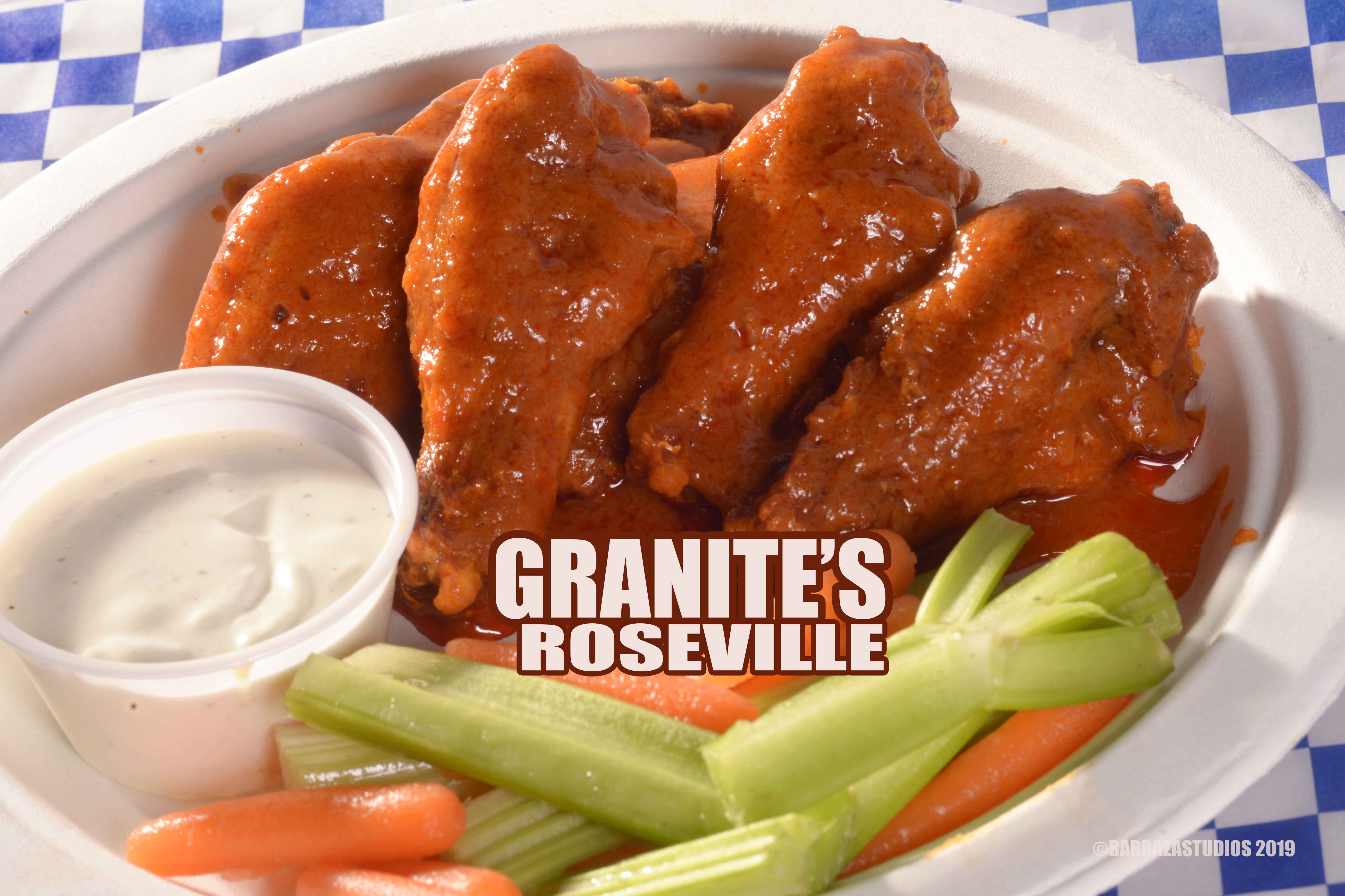 Crispy Buffalo wings served with ranch, celery, and carrots